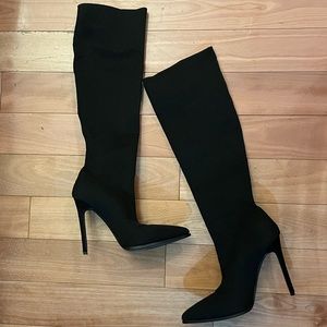 Knee high heeled boots